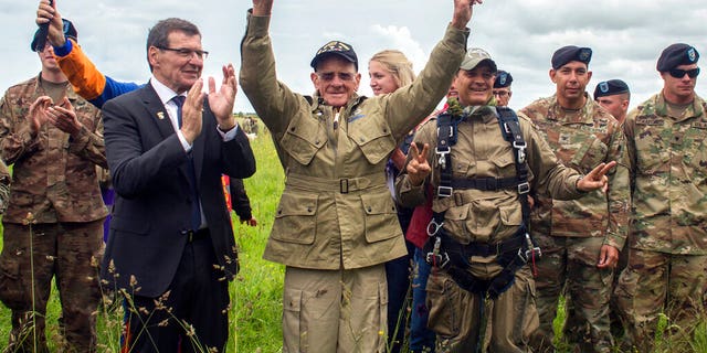 U.S. World War II D-Day veteran Tom Rice, from Coronado, CA, after parachuting in a tandem jump into a field in Carentan, Normandy, France, Wednesday, June 5, 2019.