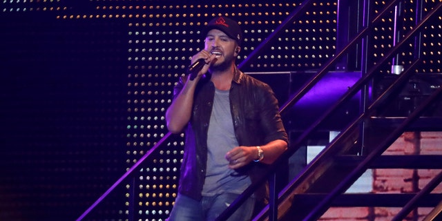 Luke Bryan performs "Knockin' Boots" at the CMT Music Awards on Wednesday, June 5, 2019, at the Bridgestone Arena in Nashville, Tenn.