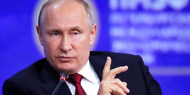 FILE: Russian President Vladimir Putin gestures while speaking at the St. Petersburg International Economic Forum in St. Petersburg, Russia.