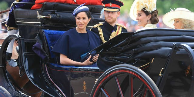 British Prince Harry, Meghan, Duchess of Sussex, Kate, Duchess of Cambridge and Camilla, Duchess of Cornwall, attend the annual ceremony 