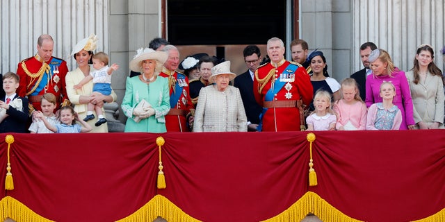 Britain's Queen Elizabeth, centre, and members of the Royal Family attend the annual Trooping the Color ceremony in London, Saturday June 8, 2019. Trooping the Color is the Queen's birthday parade and the one of the country's most impressive and iconic annual events attended by nearly every member of the Royal Family. (AP Photo/Frank Augstein)