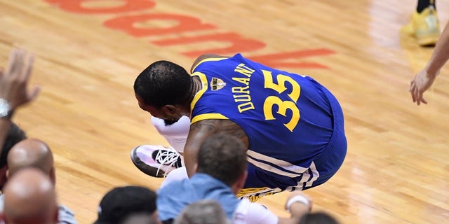 Kevin Durant (35), the Golden State Warriors forward, is injured in the leg against the Toronto Raptors in the first half of the fifth game of the NBA Finals in Toronto on Monday, June 10, 2019 (Frank Gunn / The Canadian Press via AP)