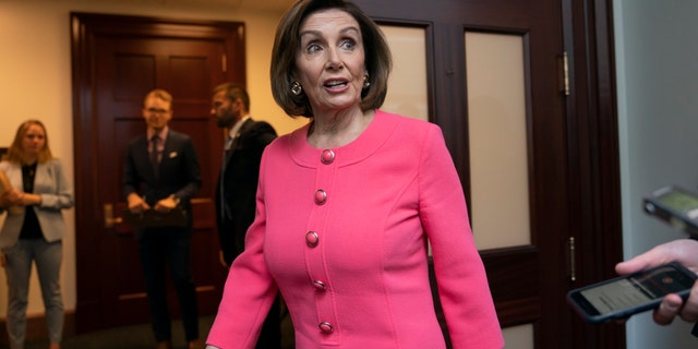 Speaker of the House Nancy Pelosi, D-Calif., arriving for a closed-door meeting with her Democratic Caucus prior to the vote.