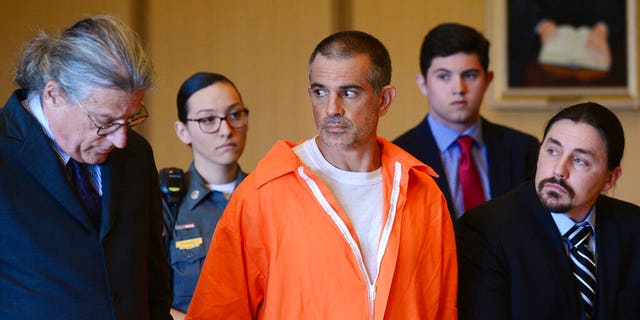 Fotis Dulos, center, seen here in June 2019, was declared dead Thursday, according to attorney Norm Pattis, left.