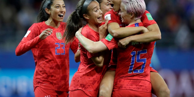United States' Alex Morgan, second right, celebrates after scoring her side's 12th goal during the Women's World Cup Group F soccer match between United States and Thailand. (AP Photo/Alessandra Tarantino)