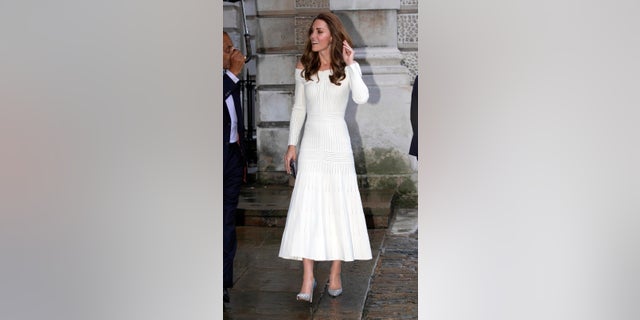 Kate, who is the Patron of Action on Addiction, polished off her look with a sparkling pair of Jimmy Choo point toe pumps, valued at $AU970, a matching clutch and Kiki McDonough diamond hoop earrings, which are currently on sale for $AU6200.