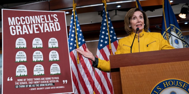 Speaker of the House Nancy Pelosi, D-Calif., reflects on bills that have passed the House but die in the Senate because Senate Majority Leader Mitch McConnell, R-Ky., does not bring them up for a vote, during a news conference on Capitol Hill. (AP Photo/J. Scott Applewhite)