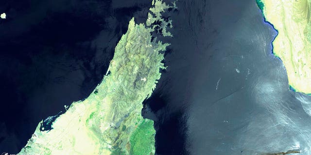 FILE: A false-color image showing the Norwegian-owned MT Front Altair, bottom right, ablaze with smoke rising from it in the Gulf of Oman after what the U.S. described as a limpet mine attack by Iran.