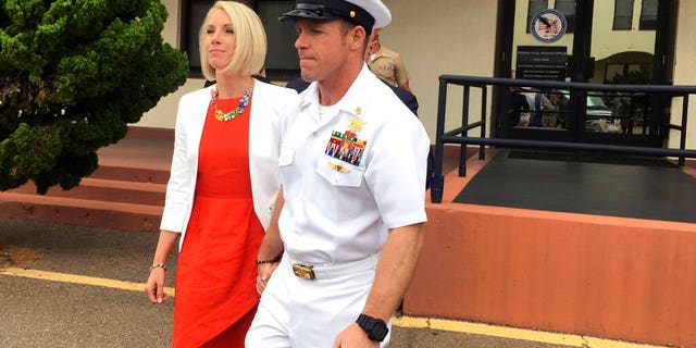 FILE: Navy Special Operations Chief Edward Gallagher leaves a military courtroom on Naval Base San Diego with his wife, Andrea Gallagher, in San Diego.