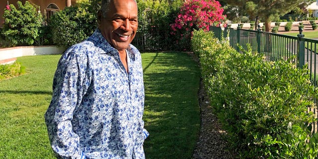 FILE: O.J. Simpson in the garden of his Las Vegas area home.
