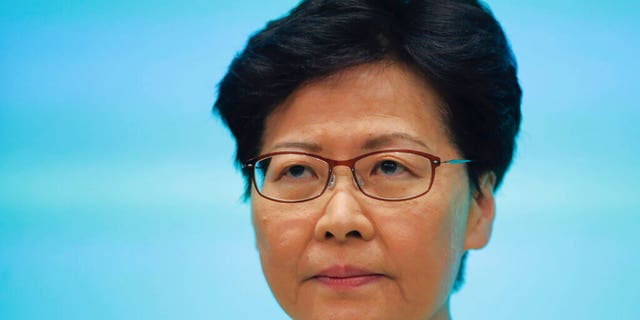 Hong Kong Chief Executive Carrie Lam pauses during a press conference at the Legislative Council in Hong Kong, Tuesday, June 18, 2019. Hong Kong leader apologizes for her handling of unpopular extradition bill, says the city needs hope. (AP Photo/Kin Cheung)