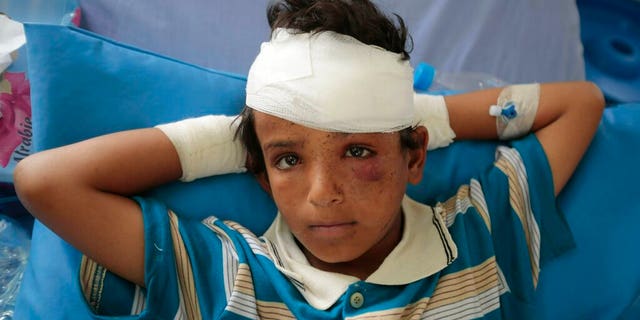 In this Aug. 12, 2018, file, photo, A child injured in a deadly Saudi-led coalition airstrike on Thursday rests in a hospital in Saada, Yemen. A database tracking violence said Wednesday, June 19, 2019 that at least 91,600 people have been killed in Yemen’s civil war, presenting a new estimate after completing reporting for the first months of fighting in 2015.