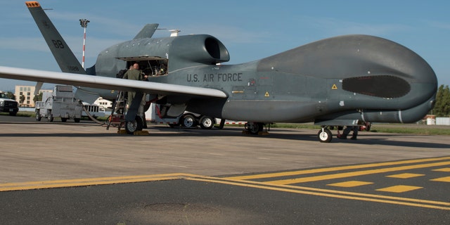 Members of the 7th Reconnaissance Squadron preparing to launch an RQ-4 Global Hawk at Naval Air Station Sigonella, Italy, in October 2018.