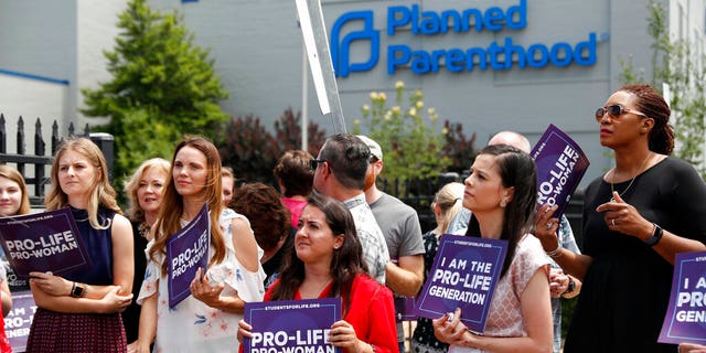 Earlier this month, anti-abortion advocates gather outside the Planned Parenthood clinic in St. Louis. Missouri's only abortion clinic. (AP Photo/Jeff Roberson, File)