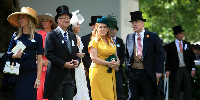 Britain's Prince Andrew, second right, and Sarah, Duchess of York, arrive during day four of Royal Ascot at Ascot Racecourse in Ascot, England.