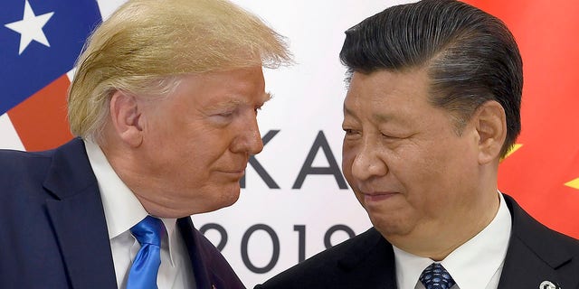 President Donald Trump, left, meets with Chinese President Xi Jinping during a meeting on the sidelines of the G-20 summit in Osaka, Japan, on Saturday. (Associated Press)