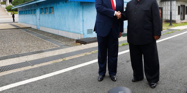 President Donald Trump meets with North Korean leader Kim Jong Un at the border village of Panmunjom in the Demilitarized Zone, South Korea, Sunday, June 30, 2019. (Associated Press)