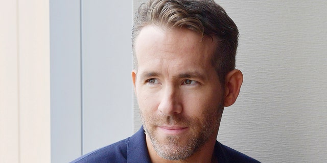 Ryan Reynolds, Canadian actor and film producer poses for photo during an interview conducted by the Yomiuri Shimbun in Tokyo on May 30, 2018. Reynolds was selected in People's Sexiest Man Alive lists in 2008 and 2009, and was awarded the top honor in 2010. ( The Yomiuri Shimbun via AP Images )