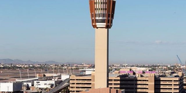 A man was arrested Tuesday after allegedly rushing a security checkpoint at the Phoenix Sky Harbor International Airport and injuring Transportation Security Administration officers.