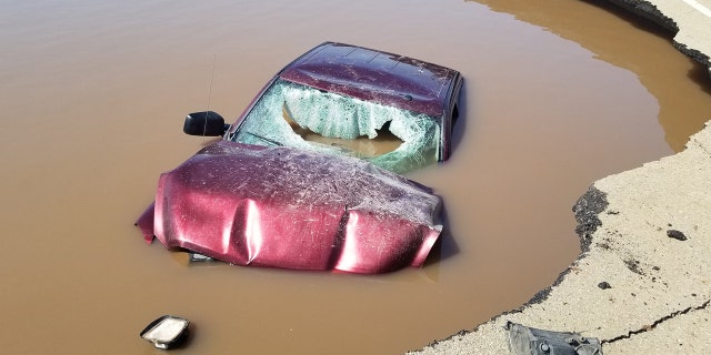 Westlake Legal Group Blackburn-Car-3 Oklahoma driver goes around roadblocks set up for flooding, ends up crashing into sinkhole Travis Fedschun fox-news/weather fox-news/us/us-regions/southwest/oklahoma fox-news/us/disasters/floods fox-news/us/disasters fox news fnc/us fnc article 9c8d98b5-2c4a-5d59-98bb-f2b249b6afc0