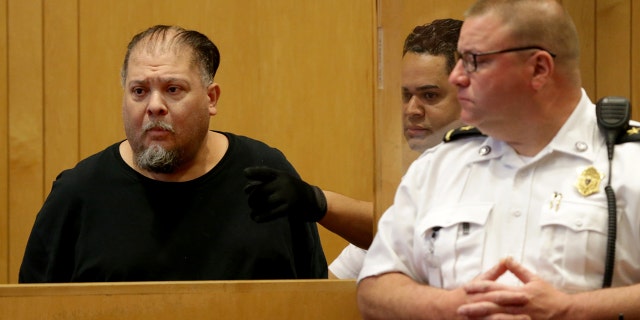 Carlos Rivera, left, appears at his arraignment at Lawrence District Court in Lawrence, MA on May 28, 2019. (Photo by Jonathan Wiggs/The Boston Globe via Getty Images)