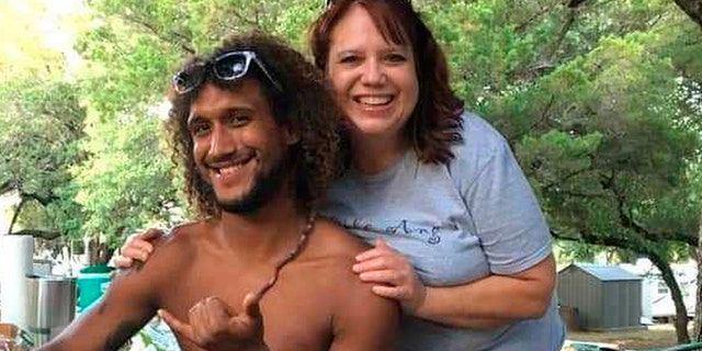 This June 2019 photo provided by Natacha Mendenhall shows Casey Williamson, left, and his mother Carla Ajaga in Possum Kingdom Lake, Texas. Mendenhall said her cousin Williamson, who worked at Oahu Parachute Center, was on board the skydiving plane that crashed Friday evening. (AP/Natacha Mendenhall)