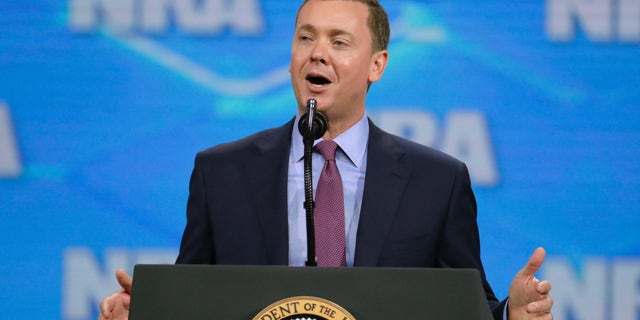 The National Rifle Association’s top lobbyist, Chris Cox, resigned Wednesday, the latest development in a dizzying array of in-fighting within the gun lobbying group in recent months that has ensnared even its most ardent loyalists. (AP Photo/Michael Conroy, File)