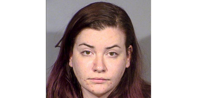 FILE - This undated Clark County Detention Center file booking photo shows Diana Nicole Pena, who pleaded guilty Tuesday, June 11, 2019, to accessory to murder after the slaying, avoiding a murder charge and telling a judge she knew at the time that former Playboy Italia and Maxim model Kelsey Turner and Jon Kennison had killed Dr. Thomas Burchard.
 (Las Vegas Metropolitan Police Department via AP, File)