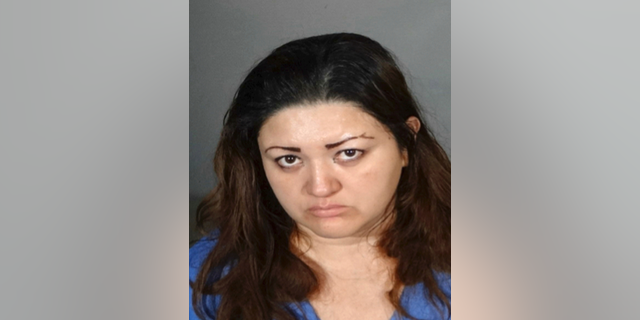 FILE - This undated booking photo provided by the Los Angeles Police Department shows Veronica Aguilar. A preliminary hearing is underway this week of June 17, 2019, in the case of Aguilar, a Los Angeles mother accused of keeping her special-needs son locked in a closet, ultimately causing his death. (Los Angeles Police Department via AP, File)