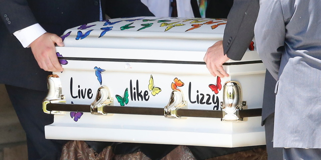 The casket for Elizabeth "Lizzy" Shelley, a 5-year-old girl who police say was taken from her home and killed by her uncle, is carried following services Tuesday, June 4, 2019, in Logan, Utah. Her uncle, Alex Whipple, is charged with killing her after his sister let him spend the night at the family's home, prosecutors said. Elizabeth "Lizzy" Shelley disappeared May 25 and was found dead less than a block from her home after a five-day search. (AP Photo/Rick Bowmer)