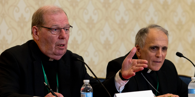 Robert Deeley, left, Bishop of the Diocese of Portland, accompanied by Cardinal Daniel DiNardo, of the Archdiocese of Galveston-Houston and President of the United States Conference of Catholic Bishops (USCCB), at a news conference in Baltimore on Tuesday.