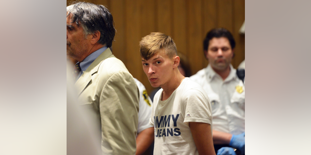 Volodymyr Zhukovskyy, of West Springfield, Mass., stands during his arraignment in Hampton District Court, June 24, 2019, in Springfield, Mass. (Associated Press)