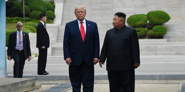 President Donald Trump and North Korean leader Kim Jong Un, stand on the North Korean side of the border in the Demilitarized Zone, Sunday, June 30, 2019 in North Korea. (AP Photo/Susan Walsh)
