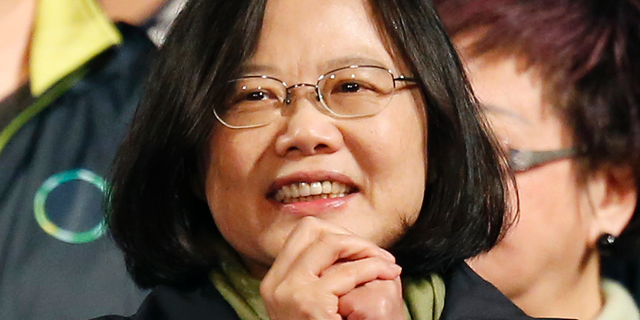 FILE - In this Jan. 16, 2016, file photo, Taiwan's Democratic Progressive Party, DPP, presidential candidate Tsai Ing-wen thanks supporters as she celebrates winning the presidential election in Taipei, Taiwan. Tsai has won a ruling party primary, setting up a likely run for re-election in January. The Democratic Progressive Party announced the primary results Thursday, June 13, 2019. (AP Photo/Wally Santana, File)