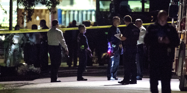 Police respond to the scene of the raid on Jan. 28 of this year. (Brett Coomer/Houston Chronicle via AP File)