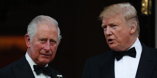 President Trump and Britain's Prince Charles outside Winfield House, the residence of the Ambassador of the United States of America to the U.K., in Regent's Park, London, on June 4, 2019. (AP Photo/Alastair Grant)