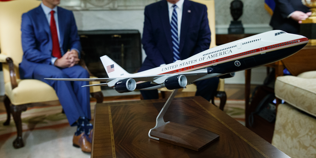 President Trump and Canadian Prime Minister Justin Trudeau meet in the Oval Office last June, behind a model of the new Air Force One model. (AP Photo / Evan Vucci, File)