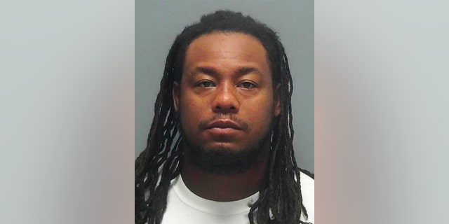 This photo provided by the Fort Myers Police Department shows Earl Antonio "Tony" Joiner. The former University of Florida football player has been arrested and charged with killing his wife in a case dating to 2016, police said. (Fort Myers Police Department via AP)