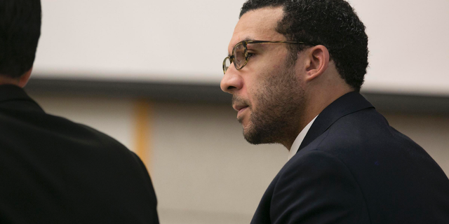 File - In this May 20, 2019, file photo, former NFL football player Kellen Winslow Jr. looks at attorney Marc Carlos during his rape trial in Vista, Calif. The former NFL star was convicted Monday, June 10, 2019, of raping 58-year-old homeless woman in San Diego County. (John Gibbins/The San Diego Union-Tribune via AP, Pool)