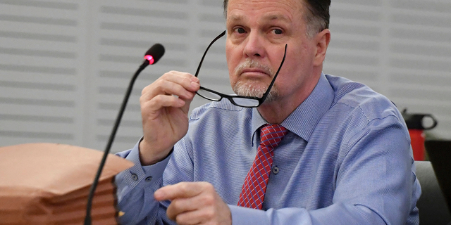 FILE - In this Jan. 7, 2019, file photo, murder defendant Charles Ray Merritt sits in San Bernardino County Court prior to opening statements in San Bernardino, Calif. A jury verdict will be read in the case of a Southern California man charged with killing a family of four and burying their bodies in the desert. The verdict will be read Monday, June 10, 2019, in court in San Bernardino in the quadruple murder case against 62-year-old Charles "Chase" Merritt. (Will Lester/The Orange County Register via AP, Pool, File)
