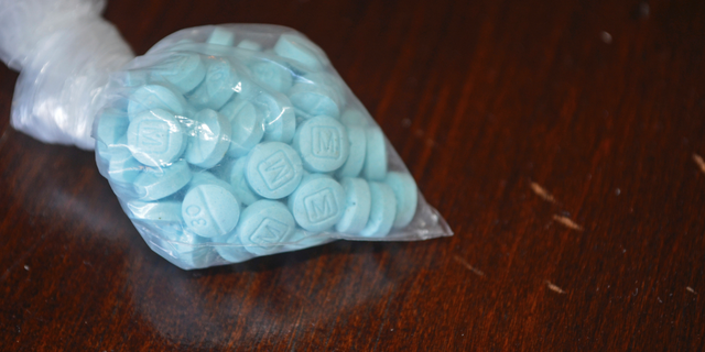 This undated file photo provided by the U.S. Drug Enforcement Administration's Phoenix Division shows a closeup of fentanyl-laced sky blue pills. (Drug Enforcement Administration via AP, File)