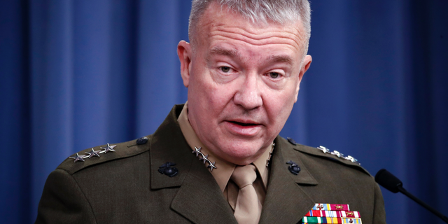 FILE - In this April1 14, 2018, file photo, then-Marine Lt. Gen. Kenneth "Frank" McKenzie speaks during a media availability at the Pentagon in Washington. McKenzie, the top commander of U.S. forces in the Mideast says Iran appears to have decided to "step back and recalculate" in response to a U.S. military buildup in the Persian Gulf area. (AP Photo/Alex Brandon, File)