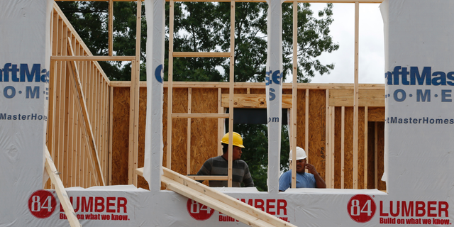 In this June 13, 2019, photo work continues on a new home in Mechanicsville, Va. On Tuesday, June 18, the Commerce Department reports on U.S. home construction in May. (AP Photo/Steve Helber)