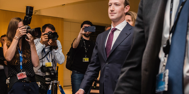 Facebook CEO Mark Zuckerberg is seen above in this file photo after leaving the European parliament.