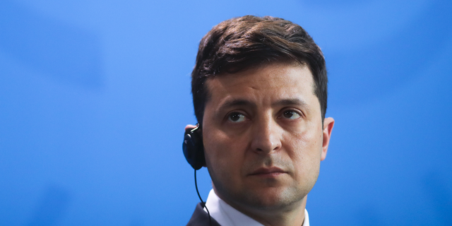 Ukrainian President Volodymyr Zelenskiy attends a joint news conference with German Chancellor Angela Merkel after a meeting at the chancellery in Berlin, Germany, Tuesday, June 18, 2019. (AP Photo/Markus Schreiber)