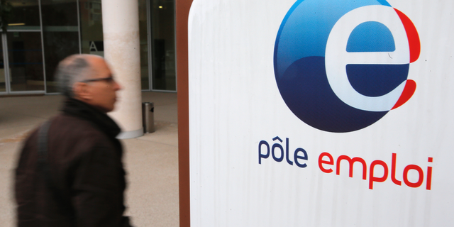 FILE - In this Feb.26, 2013 photo, a job seeker enters a job center (Pole Emploi), in Nice, southeastern France. French President Emmanuel Macron's government has unveiled its plan to tighten the country's unemployment benefits. All major workers unions denounce the reform as unfair and damaging to the country's social system. (AP Photo/Lionel Cironneau, File)