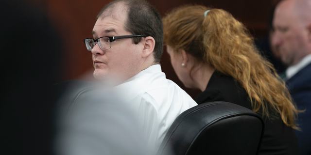 Timothy Jones Jr. looks around the courtroom during closing arguments of his trial in Lexington, S.C. on Thursday, June 13, 2019. Jones, Jr. was found guilty of killing his five young children in 2014. (Tracy Glantz/The State via AP, Pool)/