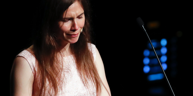 Amanda Knox gets emotional as she speaks at a Criminal Justice Festival at the University of Modena, Italy, Saturday, June 15, 2019. Knox, a former American exchange student who became the focus of a sensational murder case, arrived in Italy Thursday for the first time since an appeals court acquitted her in 2011 in the slaying of her British roommate.
