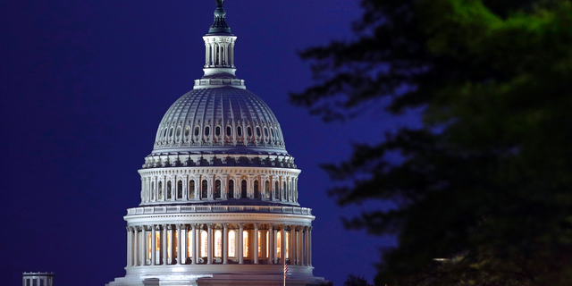 FILE - This April 18, 2019, file photo shows the dome of the U.S. Capitol in Washington. The Democratic-controlled House voted Tuesday, June 18, 2019, to block President Donald Trump’s move to restrict transgender men and women from military service. (AP Photo/Patrick Semansky, File)
