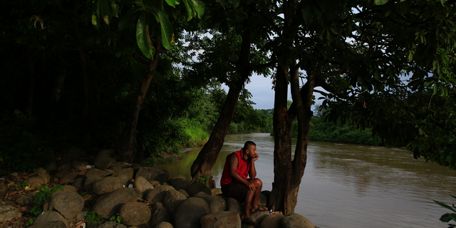 A local resident relaxes beside the Suchiate river in Frontera Hidalgo, Mexico, on the border with Guatemala, Thursday, June 13, 2019. Mexico announced recently that it’s sending National Guard agents to its southern region for immigration enforcement as part of a deal with Washington to avoid President Donald Trump’s threatened tariffs on Mexican imports. (AP Photo/Rebecca Blackwell)